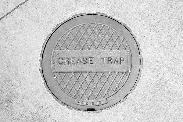 regular grease trap pumping helps prevent clogs, odors, and potential health hazards in your kitchen