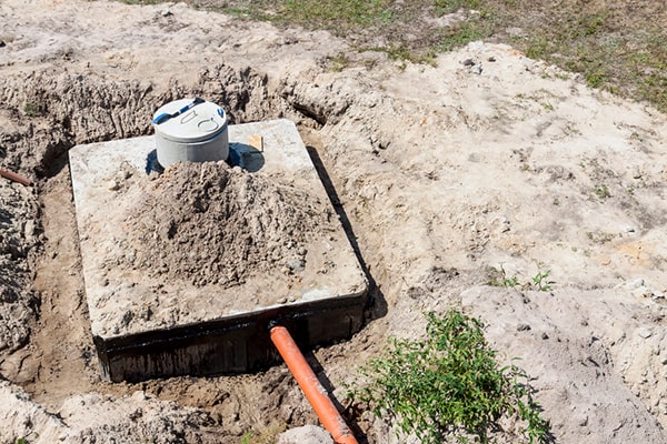 foul odors, slow draining, and sewage backups are common signs that your septic tank needs pumping